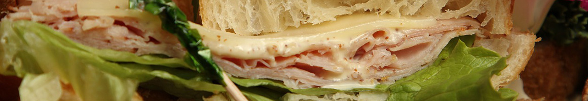 Eating Sandwich Cheesesteak at Gentile's Authentic Philadelphia Cheesesteaks restaurant in Sarasota, FL.